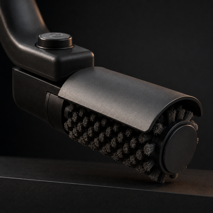 Close view of the CharBreaker Pro rotating brush head and protective hood